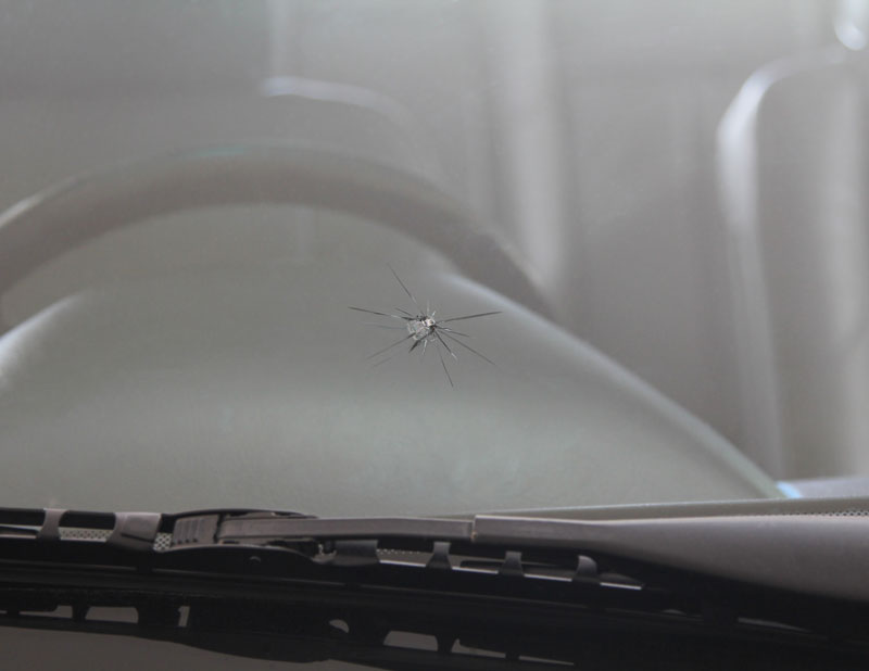 Rock-Chip close up view of a rock chip on a windshield
