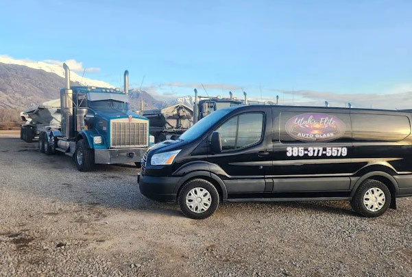 Van Utah's Elite Auto Glass work Van at a work site
